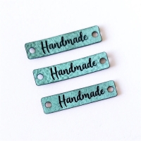 Metka z ekoskóry HANDMADE miętowa z czarnym napisem