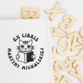Stempel exlibris z kotem i książką – odbicie wzoru