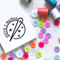 stempel z igłą i nitką